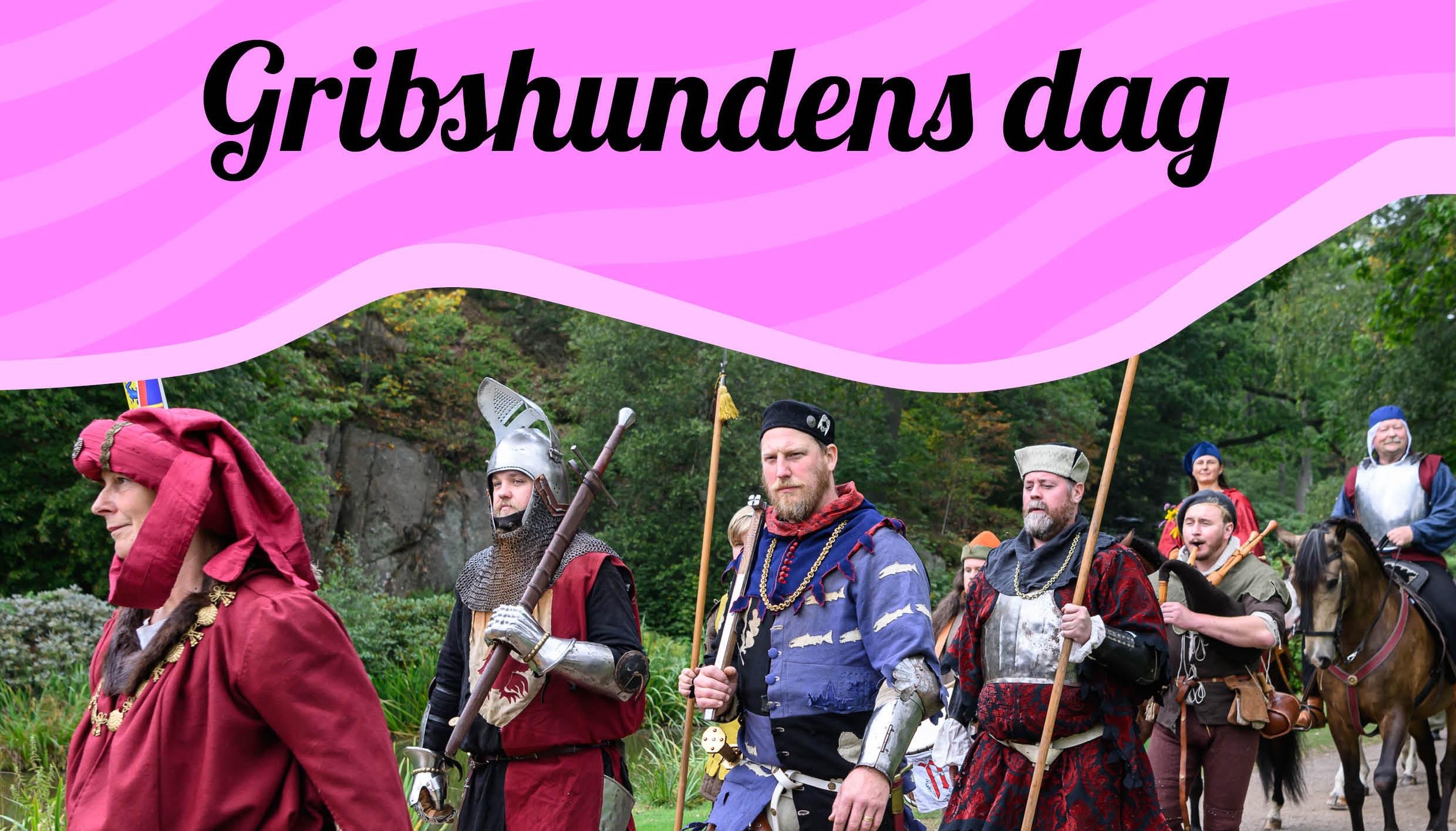 Medeltidsklädda personer.